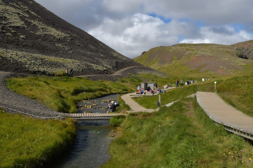 reykjadalur hot spring hike — You'll also pass a geo-monitoring station on the hillside, which is a reminder…